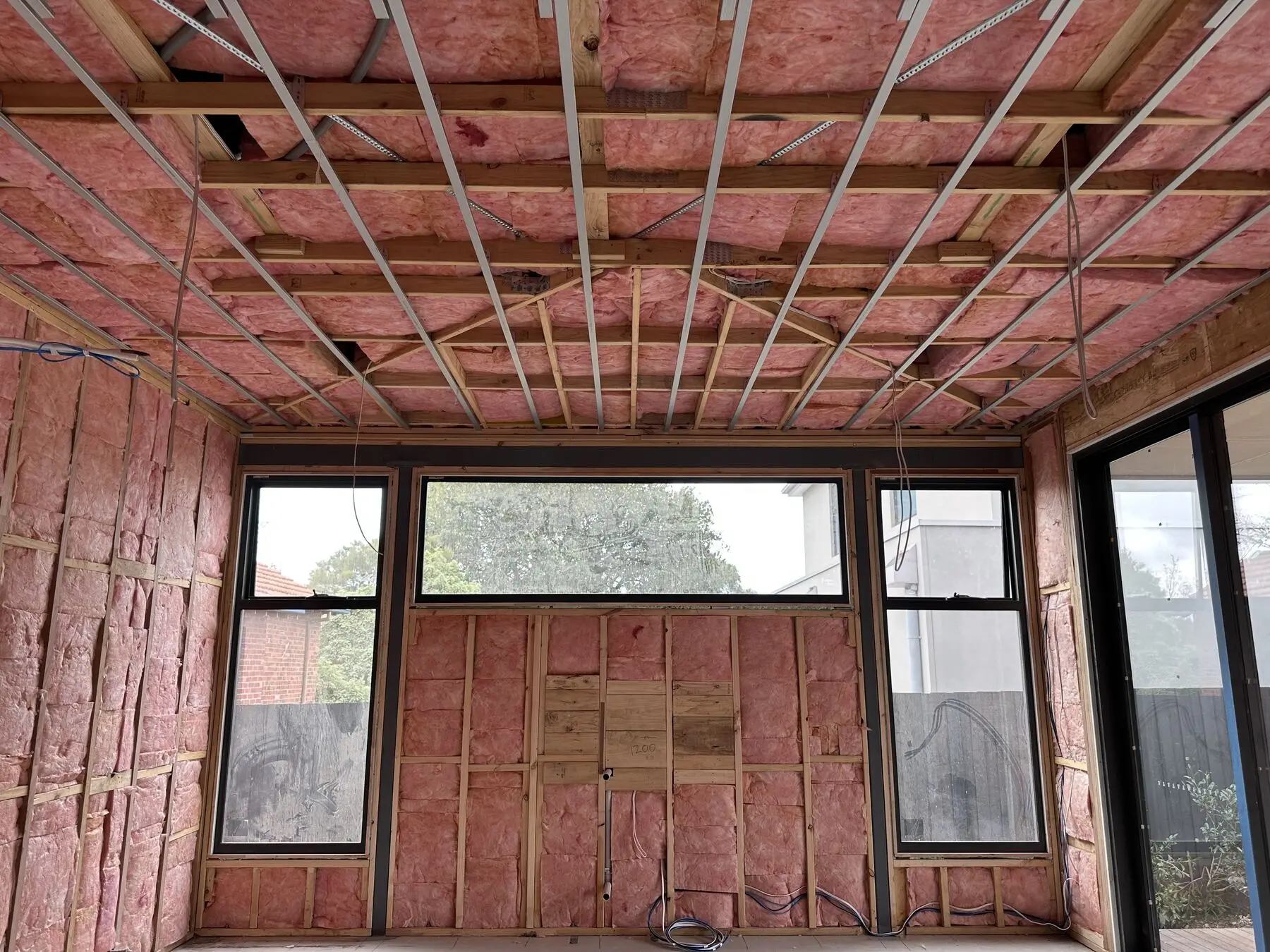 Room with ceiling and walls insulated