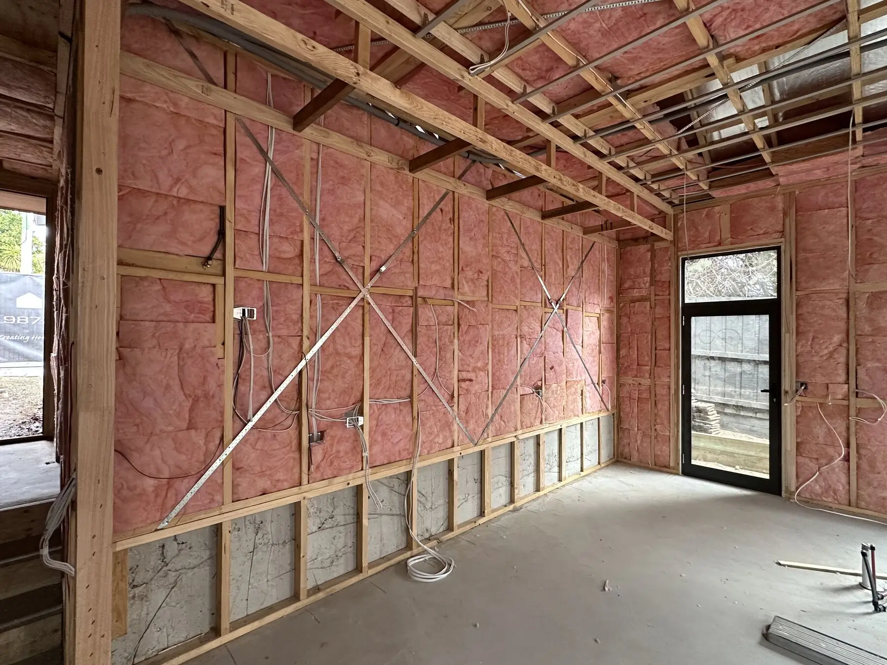 New home frame with wall batts installed