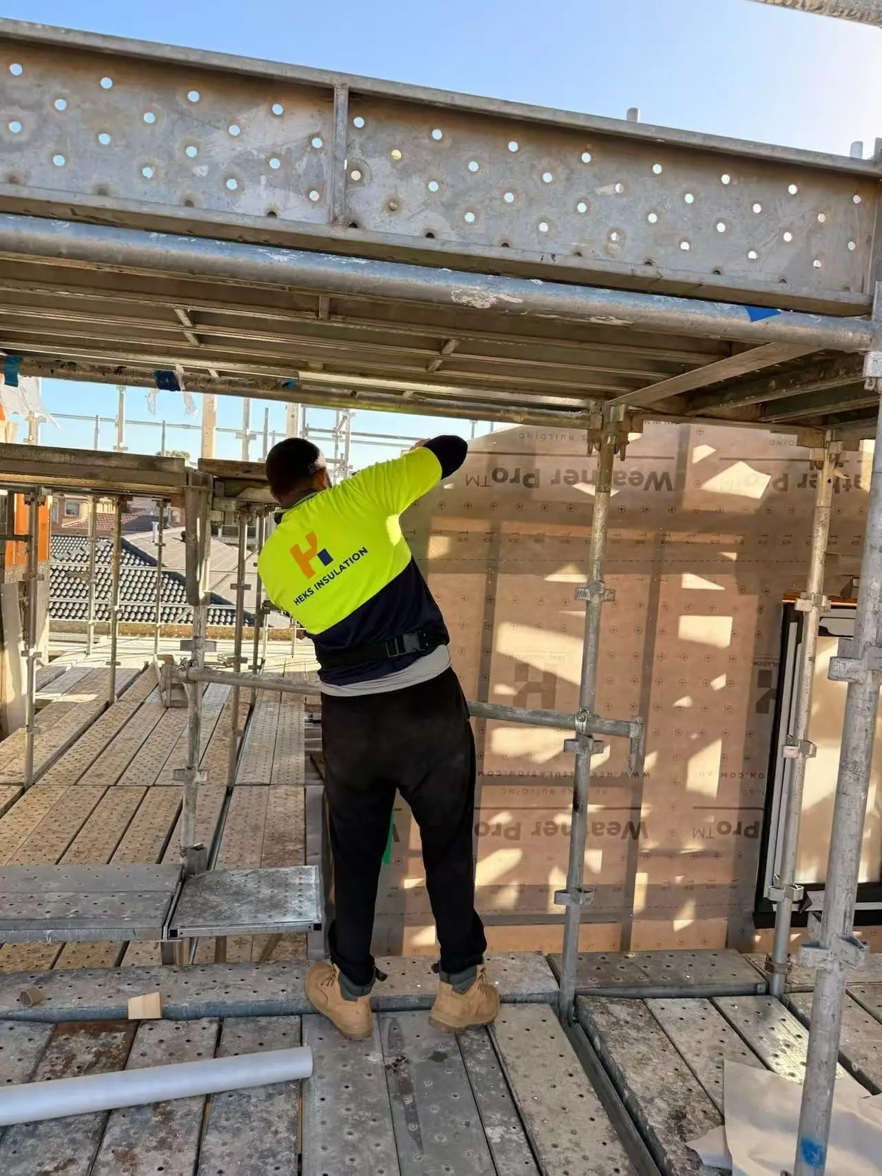 Rigid insulation boards fixed to a frame
